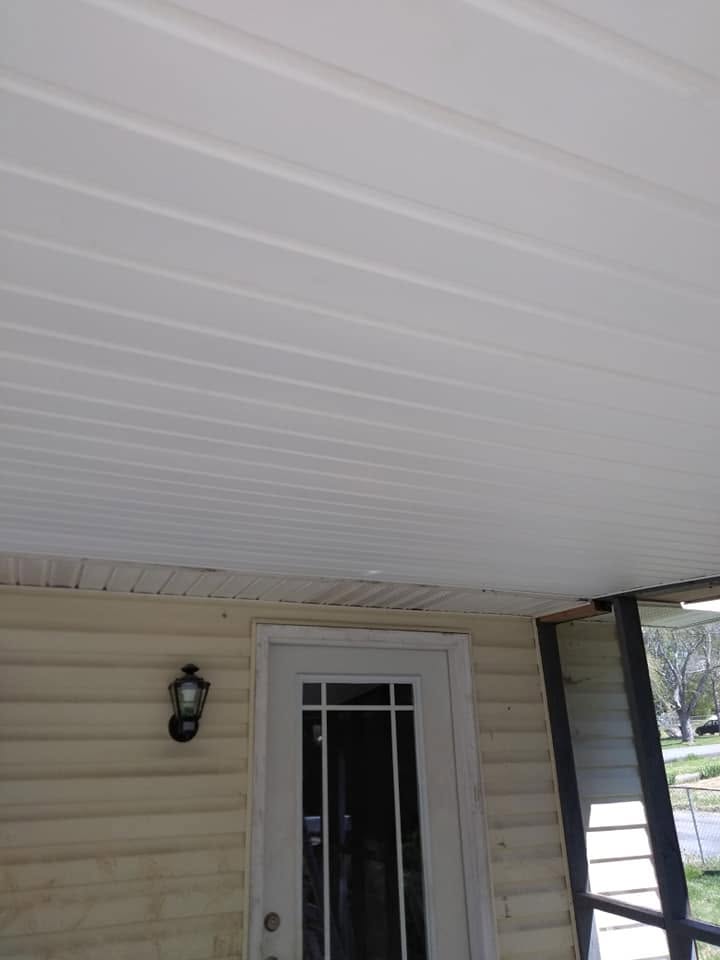 Finished white porch ceiling paneling